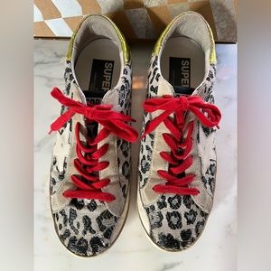 Golden Goose sneakers- Superstar. Black leopard with red laces and gold heel.